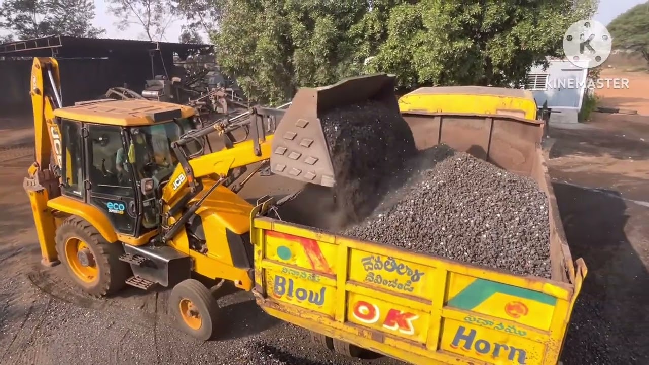 Jcb with loading Iran mall in tipper 