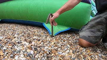 SETTING UP A BOUNCY CASTLE ON GRAVEL - Bouncy Castle Videos