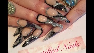 Acrylic Nails - Black and silver stiletto nails sculpted