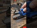 This Tiny Electric Blue Chainsaw Slices into a Mini Train Engine with Crazy Clean Detail and Realist