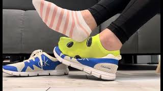 Calvin Klein running shoes with mismatched socks outfit