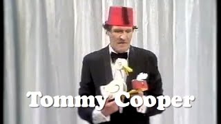 Tommy Cooper performs a selection of tricks and gags