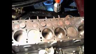 1948 Plymouth MOPAR flathead 6 turning over with head off, showing pistons & valves