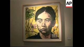 A marijuana plant is the central exhibit at an art show in California