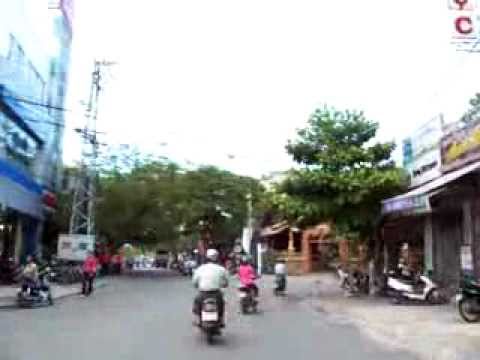 Scooter ride through Da Nang, Viet Nam. Motor scooters in Vietnam.