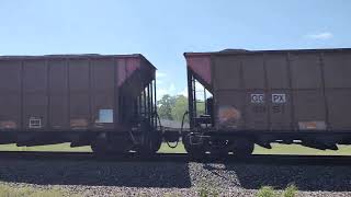 UP 8357 leads dusty loaded coke train, 6/18/22