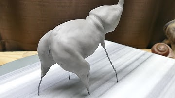 Sculpting an Elephant, part 4: Adding clay to the body