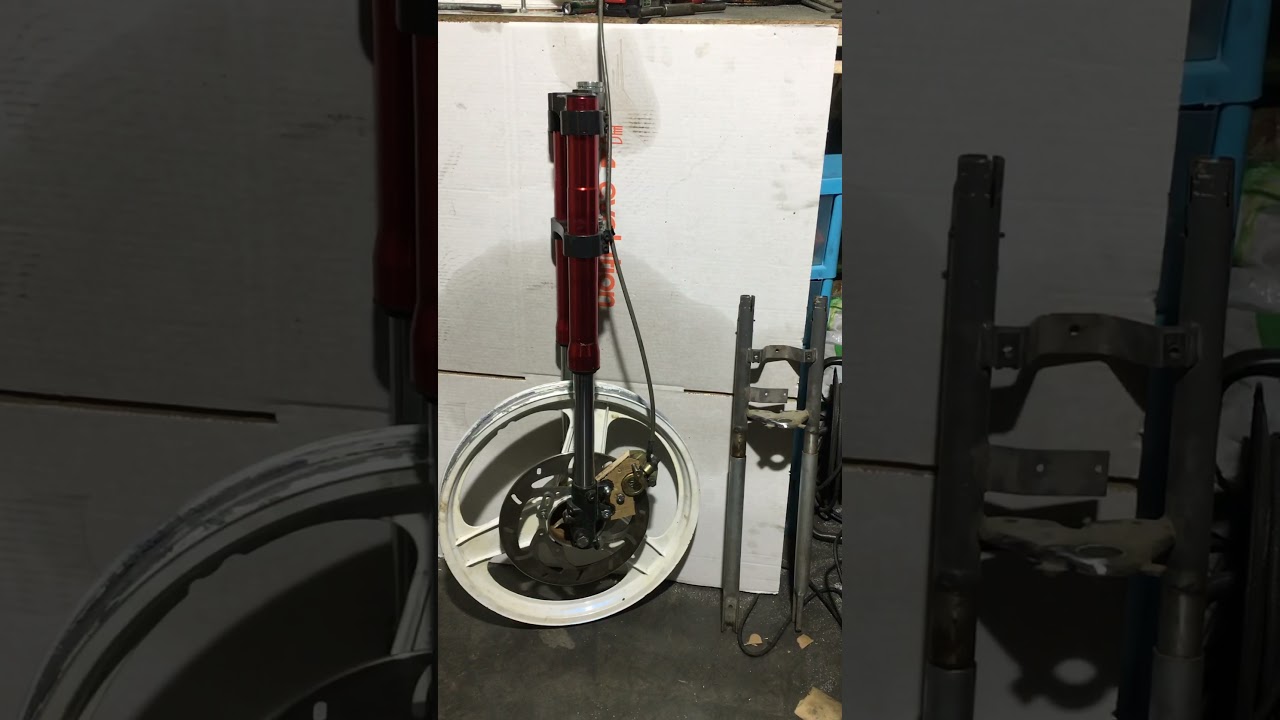 103 SPX Hybride Début adaptation fourche dirt bike et frein à disque.