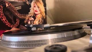 Dolly Parton  “purple  rain” Rockstar!