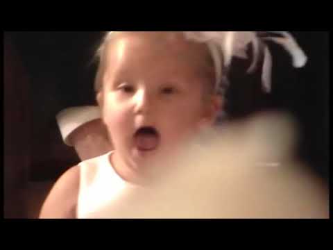 Funny flower girl yells down the aisle for the groom