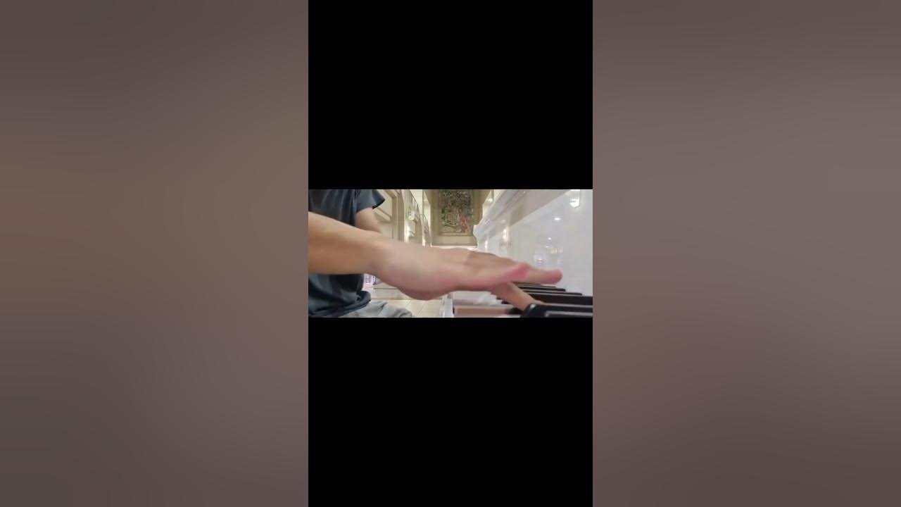 Playing Tan Tock Seng Hospital’s iconic white baby grand piano - Rach's Prelude op.23 no.5