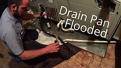 HVAC Service: Secondary Drain Pan Flooded and A Shocking Air Conditioning Unit 8-19-15