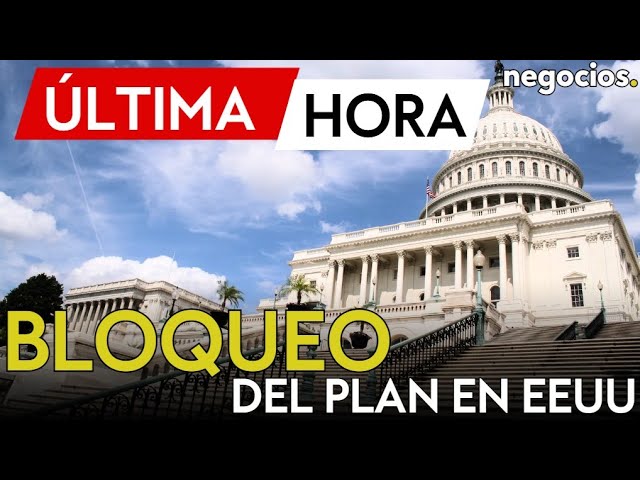 Captura del vídeo de Negocios TV mostrando titulares sobre el bloqueo del Senado y la crisis del gobierno en EE.UU.