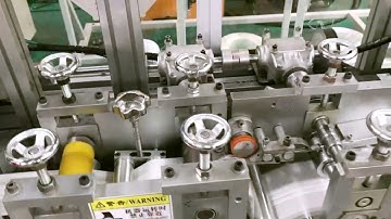 Soft earloop masks making production line with raw materials correctifier