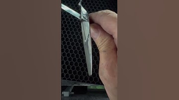 Rest your shears in a closed position on a soft surface or dedicated scissor mat