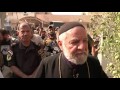Mosul battle: Priest returns to his church and home in Bartella
