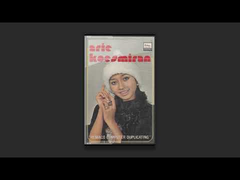 Arie Koesmiran – John