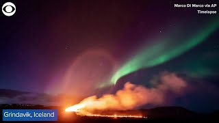 Timelapse video captures northern lights above erupting volcano in Iceland