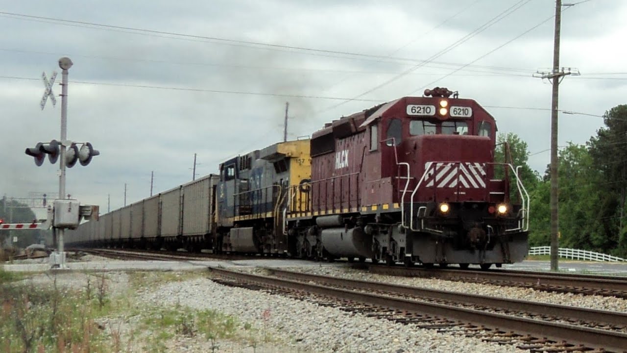 HLCX 6210 leads CSX U250 in Fairburn, GA - YouTube