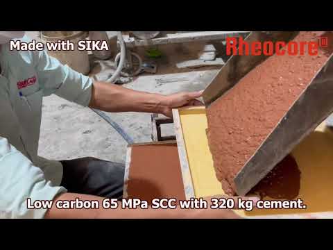 Low carbon self-compacting concrete 65+ MPa with 320 kg cement/m3. Reduced carbon by over 50%.