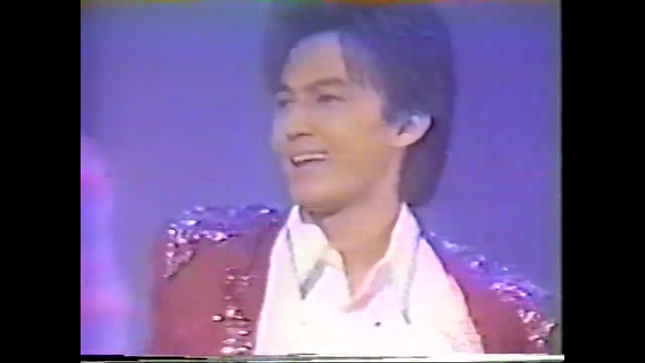 B'z『太陽のKomachi Angel』