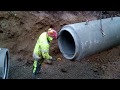 Excavator Laying Concrete Drain Pipes, The Whole Experience!