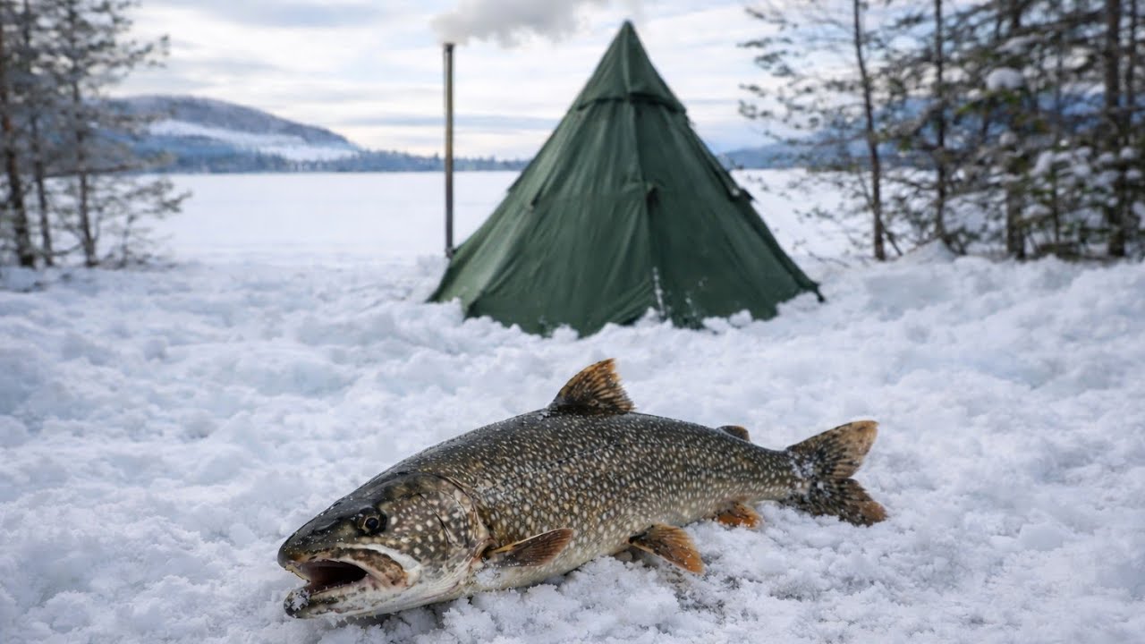 Solo Hot Tent Camping and Ice Fishing on a Mountain Lake | Record Trout Catch!