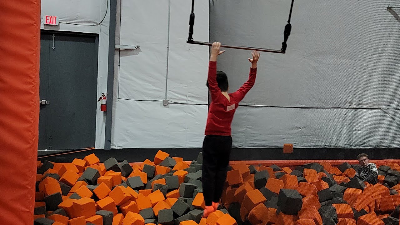 Swinging and Jumping into a Foam Pit | Air Madness Trampoline Park 