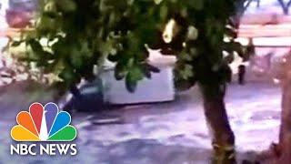 Video Shows Moment 20-Foot Tsunami Wave Strikes Indonesian Town | NBC News