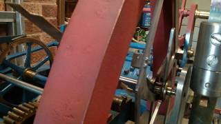 Close up of the double three-legged gravity escapement in action