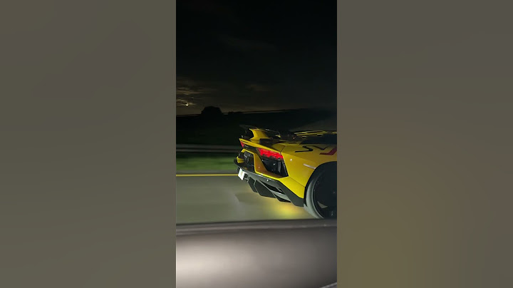 Lamborghini aventador SVJ with gintani exhaust shooting flames