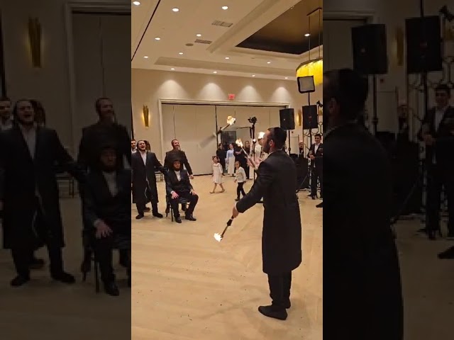 Juggling fire 🔥 at a Jewish Wedding