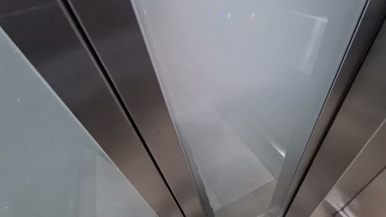 I got stuck in the lift at Canary Wharf, Bridge to Churchill Place