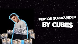 person surrounded by cubes transition