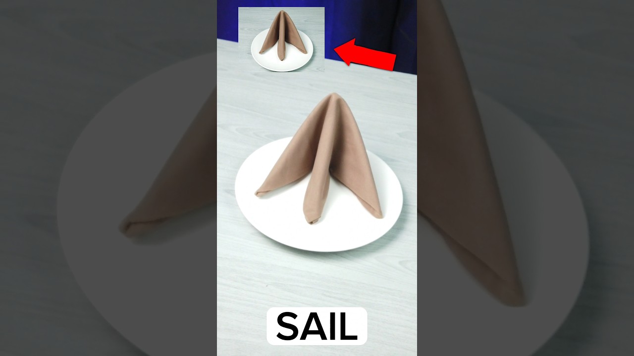 TABLE NAPKIN FOLDING SAIL DESIGN