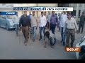 Rajkot cops made criminal parade publicly on his knees