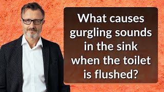 What causes gurgling sounds in the sink when the toilet is flushed?