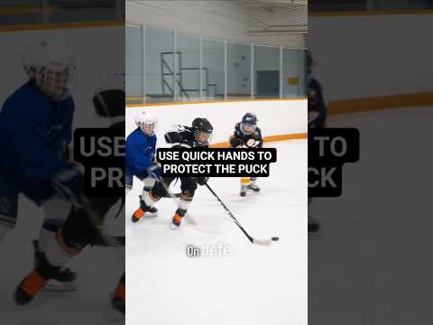 USE QUICK HANDS TO PROTECT THE PUCK #hockeycoaching #hockeytraining
