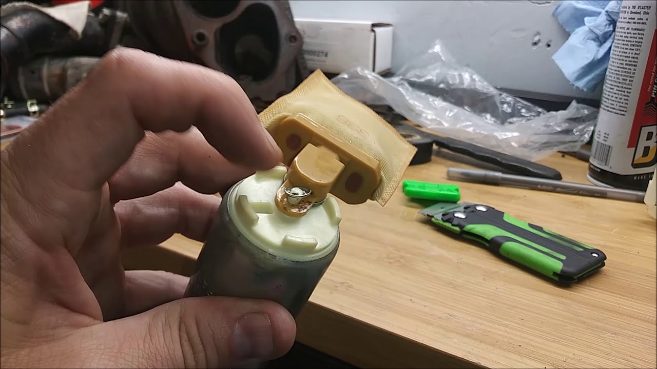 Walbro 450 fuel pump install in Evo 8