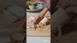 "So satisfying banana roots cutting in my cozy kitchen"