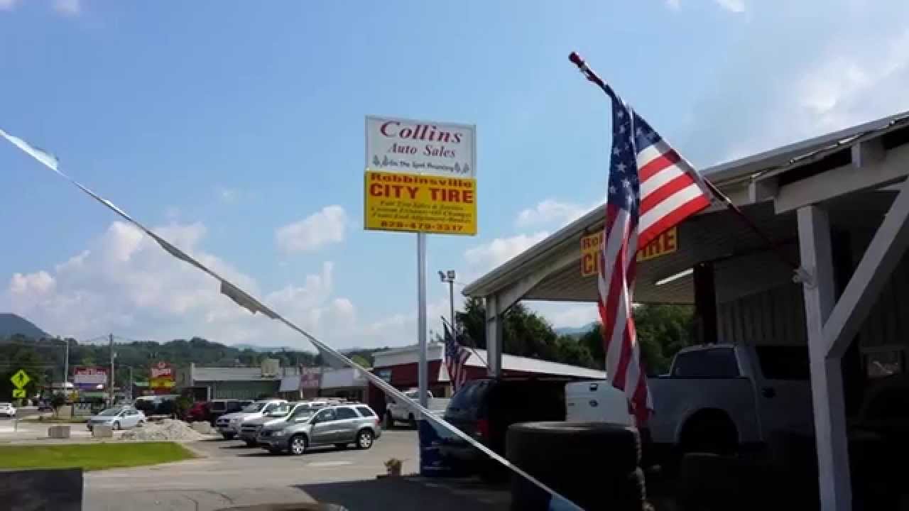 American Flag: at MOUNTAIN MOTORS A Local tire store in Robbinsville NC