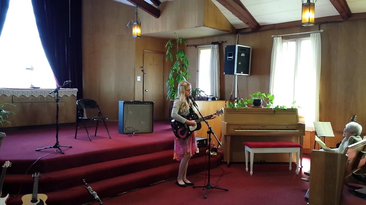 Montana Miller singing at her recital 2013