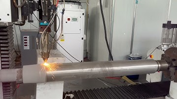 Laser cladding machine is processing a piston rod