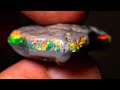 Grinding into this uncut rough opal the gems emerged