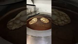 Making naan in a tandoor oven