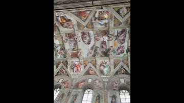 The "Creation"  at the ceiling of Sistine Chapel.  One of Michaelangelo