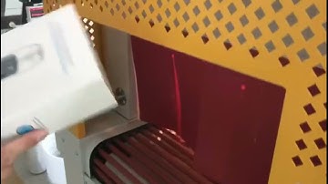 Automatic box shrink wrap packing machine