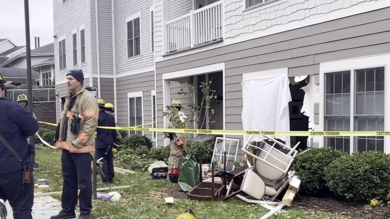 One dead after car crashes into apartment - YouTube