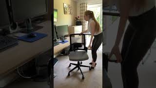 Knees up on the chair.
