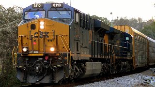 CSX 3110 leads CSX M587-21 flying in Lilburn, GA.
